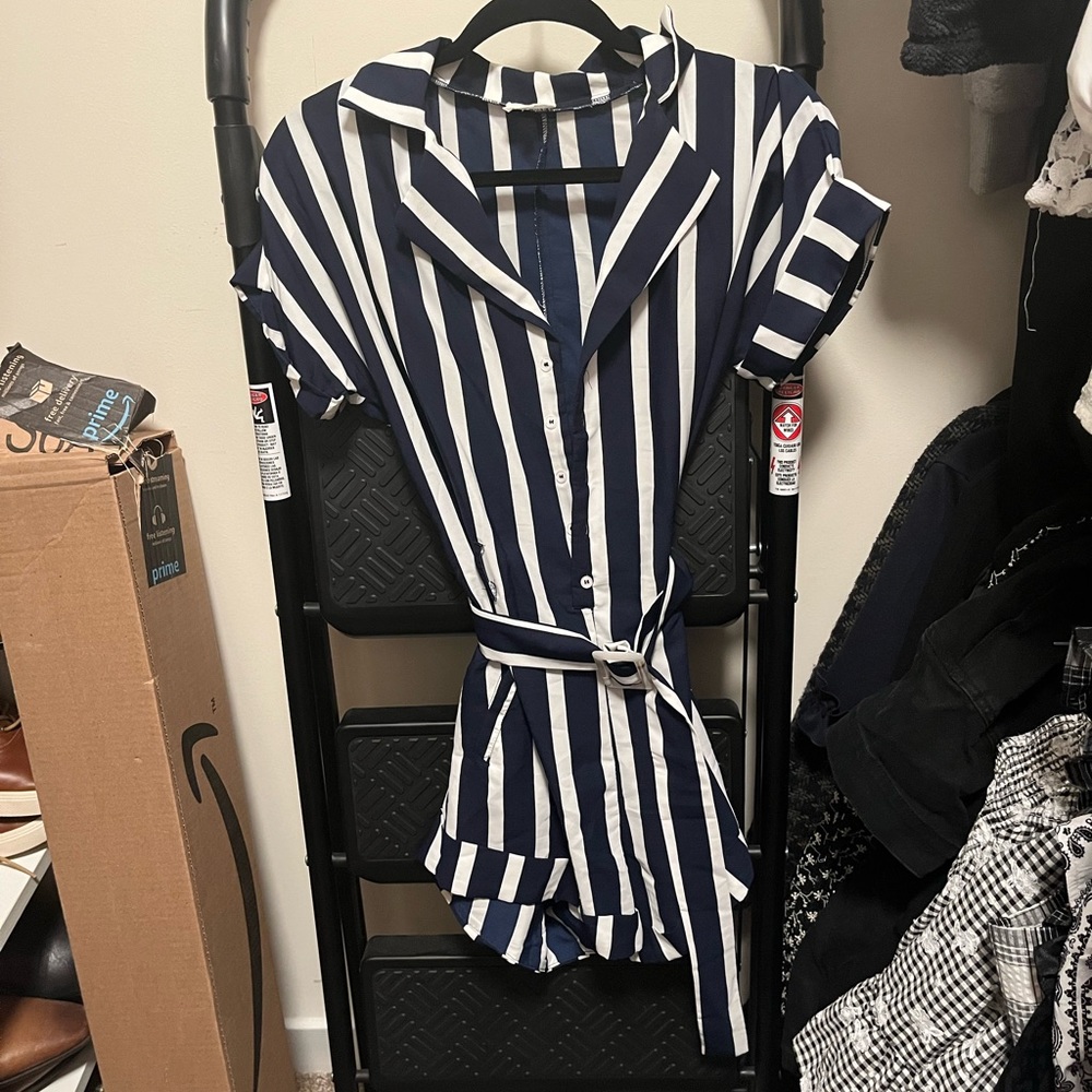 Navy blue and white striped romper. Only worn once!